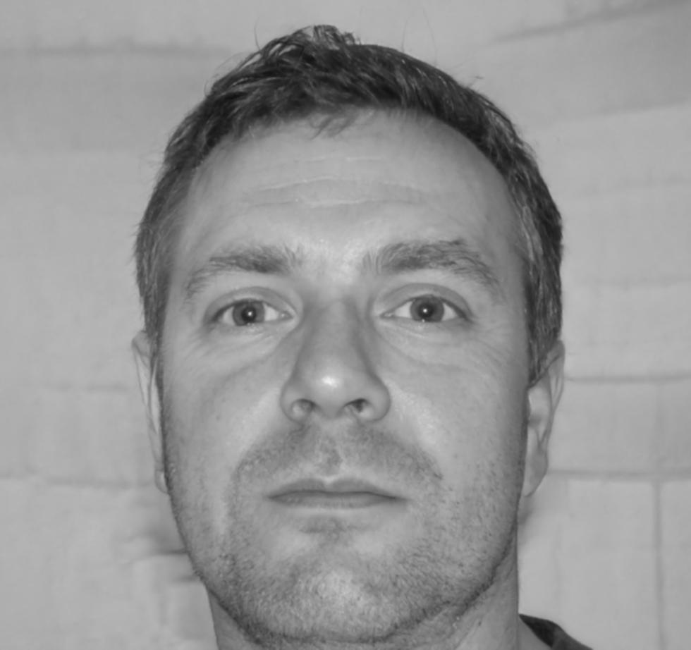 Professional headshot of Kieran Blackwood, Senior Financial Analyst